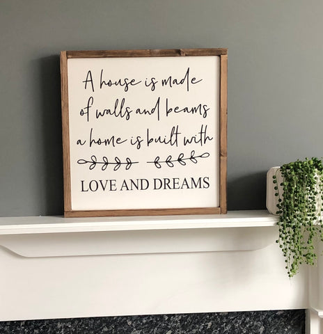 A house is made of walls and beams, a home is made of love and dreams - Handmade wooden sign